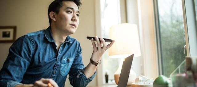 a man taking a call in the home office